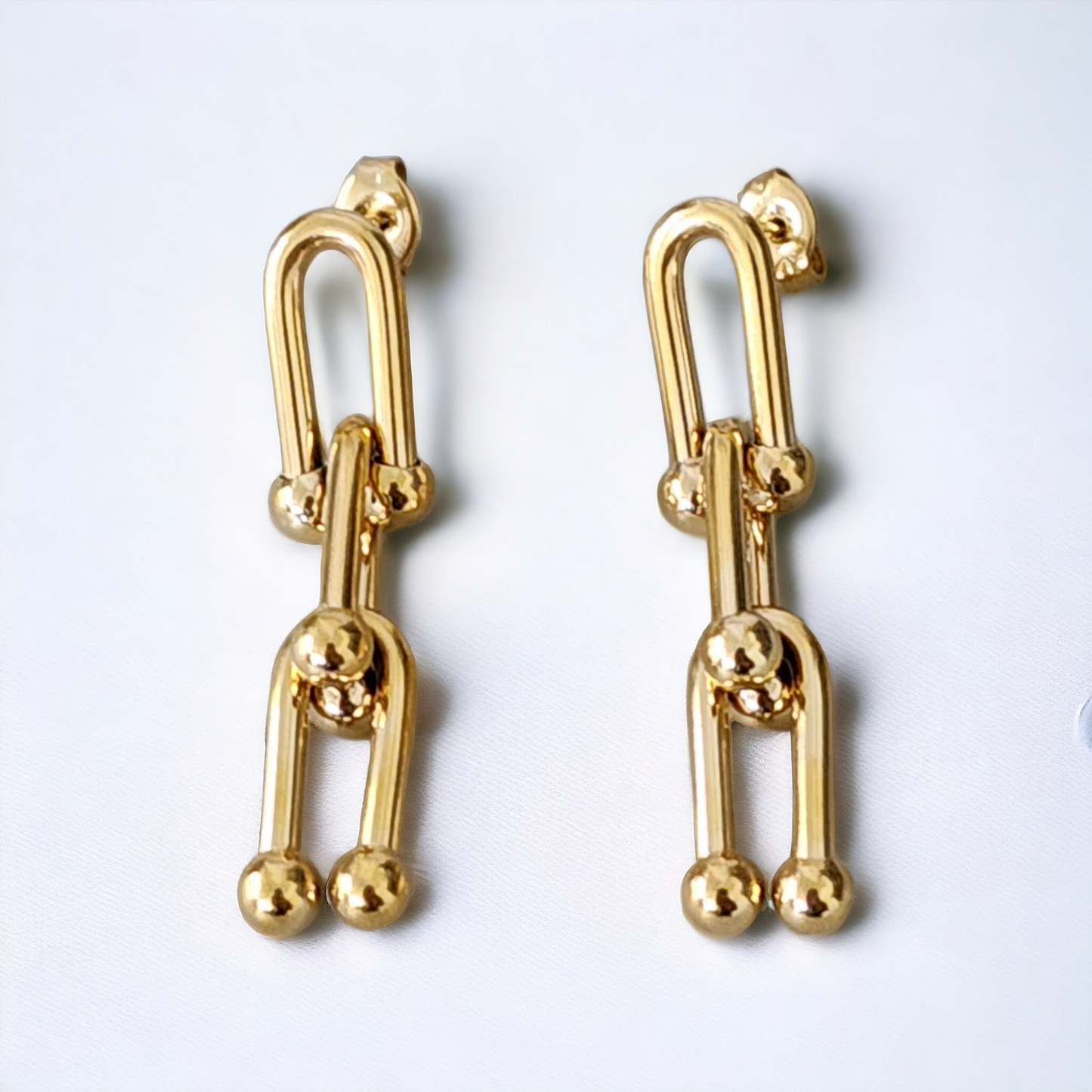 Aretes Clara Doble U
