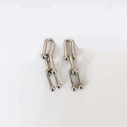 Aretes Clara Doble U